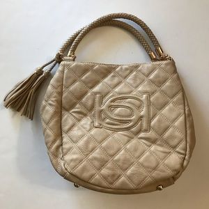Bebe Faux Leather Taupe Tassel Quilted hand bag